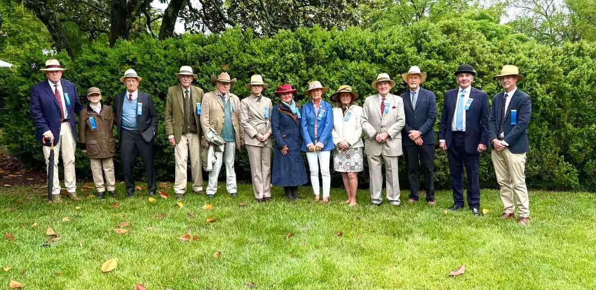 Line of judges wearing hats
